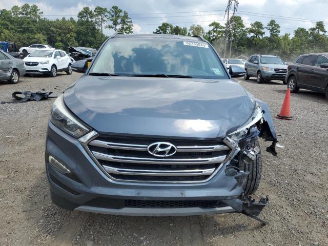 KM8J33A2XJU646892 - 2018 HYUNDAI TUCSON VALUE GRAY photo 5