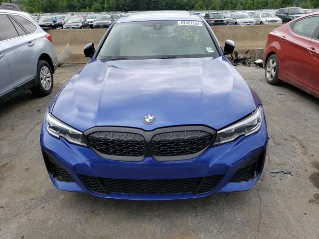 3MW5U7J09M8C14236 - 2021 BMW M340I BLUE photo 5