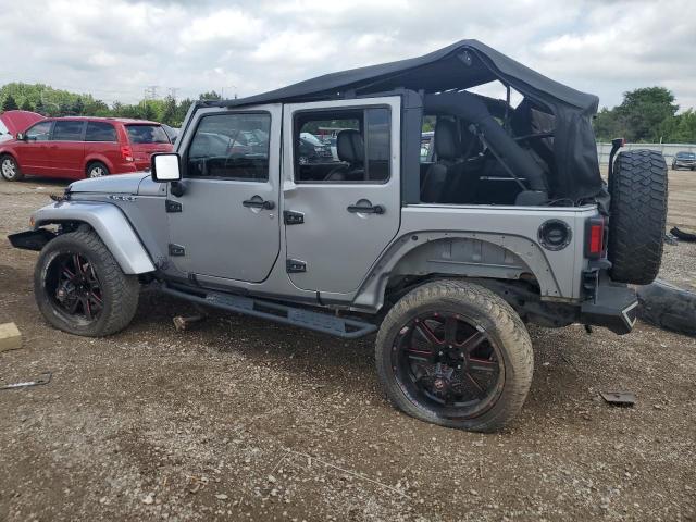 1C4BJWEG2EL106955 - 2014 JEEP WRANGLER U SAHARA GRAY photo 2