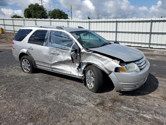 1FMDK03W59GA03651 - 2009 FORD TAURUS X LIMITED SILVER photo 4