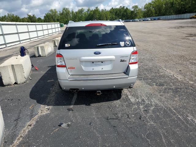 1FMDK03W59GA03651 - 2009 FORD TAURUS X LIMITED SILVER photo 6