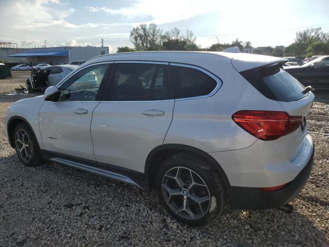 WBXHT3C36GP885570 - 2016 BMW X1 XDRIVE28I WHITE photo 2