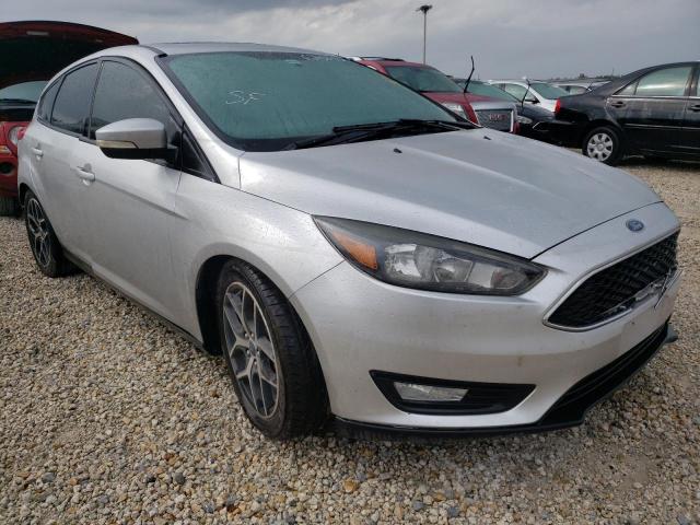 1FADP3M24HL249220 - 2017 FORD FOCUS SEL SILVER photo 1