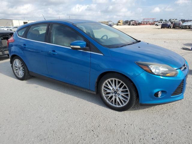 1FADP3N24EL195122 - 2014 FORD FOCUS TITANIUM BLUE photo 4