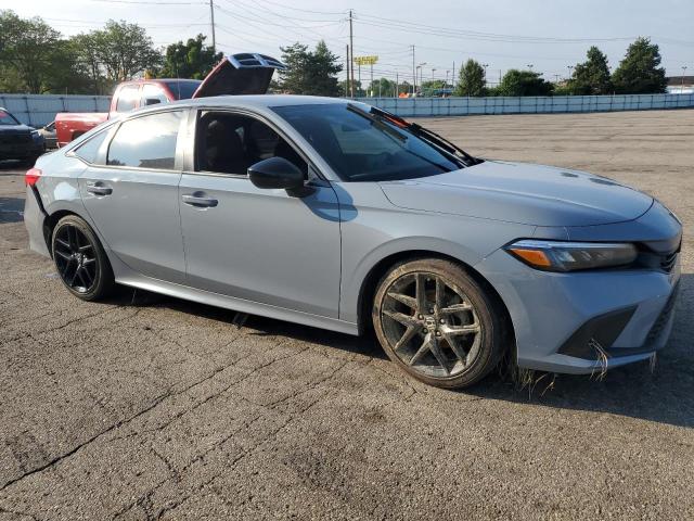2HGFE2F55PH532734 - 2023 HONDA CIVIC SPORT GRAY photo 4