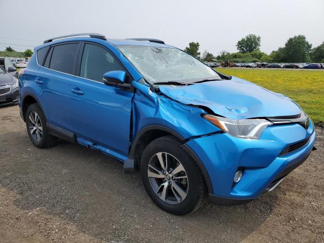 2T3RFREV3JW702129 - 2018 TOYOTA RAV4 ADVENTURE BLUE photo 4