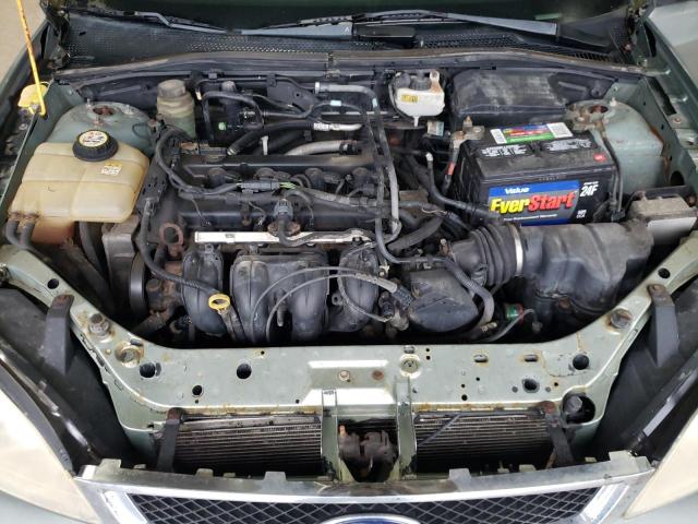 1FAFP34N66W112228 - 2006 FORD FOCUS ZX4 GREEN photo 11