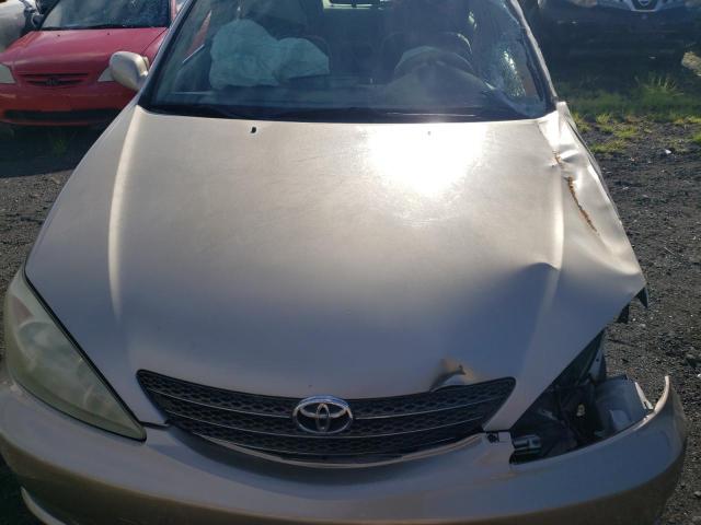 JTDBE30K030174524 - 2003 TOYOTA CAMRY LE 金色 照片 11