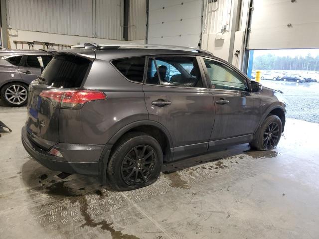 2T3BFREV2JW696681 - 2018 TOYOTA RAV4 LE CHARCOAL photo 3