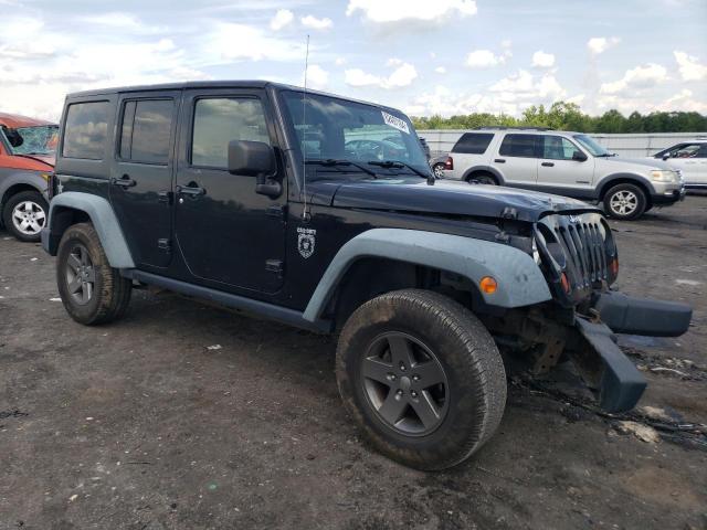 1J4HA6H10BL536247 - 2011 JEEP WRANGLER RUBICON BLACK photo 4