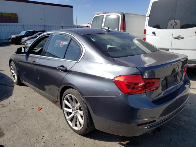WBA8E1C59JA165698 - 2018 BMW 330E GRAY photo 2
