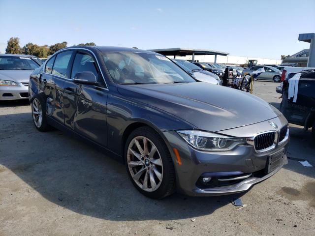 WBA8E1C59JA165698 - 2018 BMW 330E GRAY photo 4