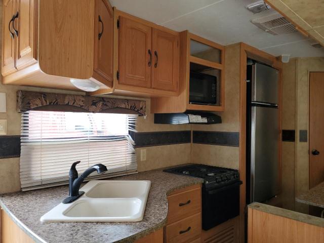 4YDT26R25A7200442 - 2010 KEYSTONE HORNET WHITE photo 7