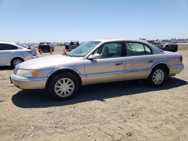 1LNHM97V72Y629705 - 2002 LINCOLN CONTINENTA TAN photo 1