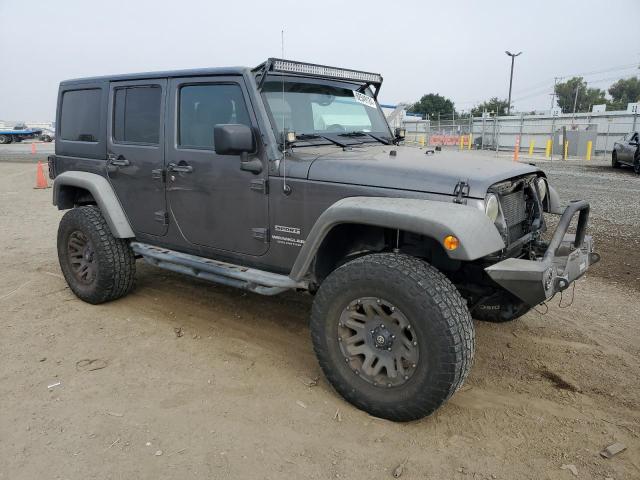 1C4BJWDG7GL310266 - 2016 JEEP WRANGLER U SPORT ნაცრისფერი ფოტო 4