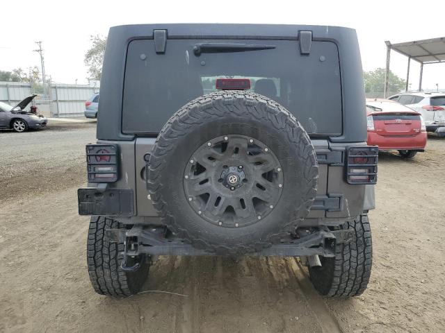 1C4BJWDG7GL310266 - 2016 JEEP WRANGLER U SPORT GRAY photo 6