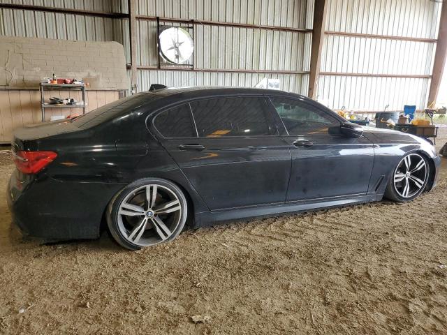 WBA7E2C55GG738863 - 2016 BMW 740 I أسود صورة 3