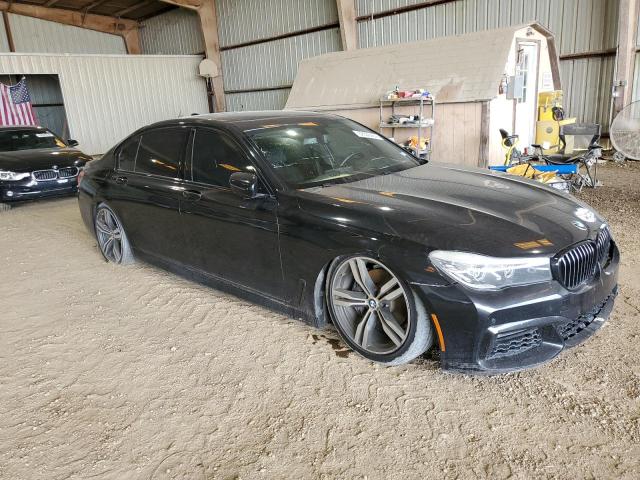 WBA7E2C55GG738863 - 2016 BMW 740 I أسود صورة 4