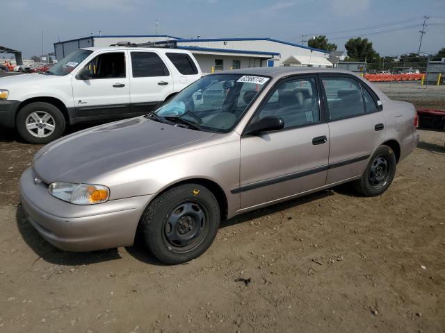 1Y1SK5281WZ412477 - 1998 CHEVROLET GEO PRIZM BASE TAN photo 1