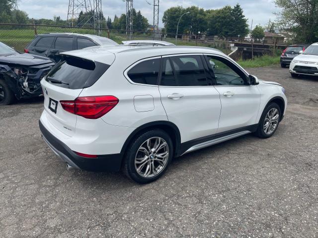 WBXHT3C5XK5N46381 - 2019 BMW X1 XDRIVE28I WHITE photo 4