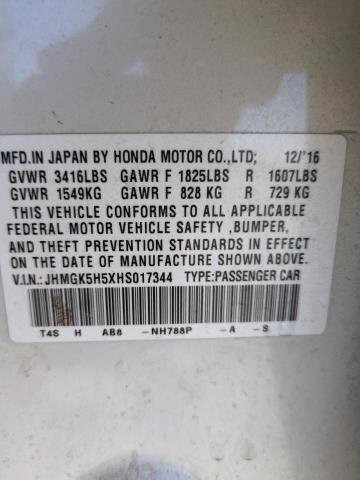 JHMGK5H5XHS017344 - 2017 HONDA FIT LX WHITE photo 13