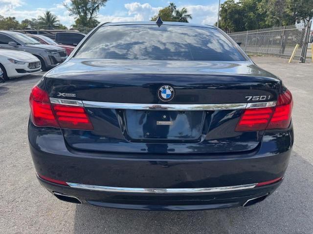 WBAYB6C5XFD965910 - 2015 BMW 750 XI BLUE photo 6