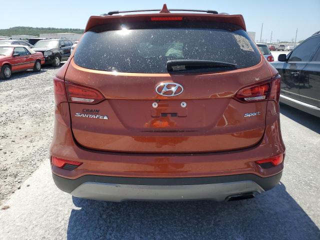 5XYZU3LB5HG411426 - 2017 HYUNDAI SANTA FE S ORANGE photo 6