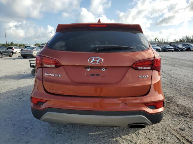 5XYZU3LBXJG510233 - 2018 HYUNDAI SANTA FE S ORANGE photo 6