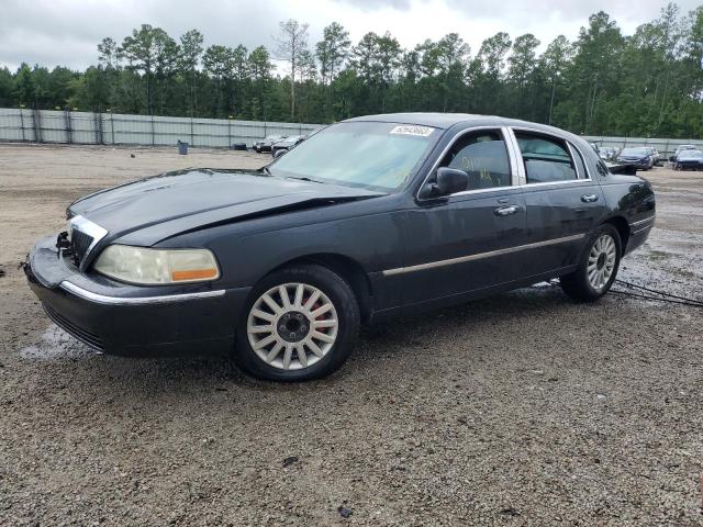 1LNHM81W33Y649799 - 2003 LINCOLN TOWN CAR EXECUTIVE BLACK photo 1