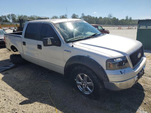 1FTPW12565KD81487 - 2005 FORD F150 SUPERCREW SILVER photo 4