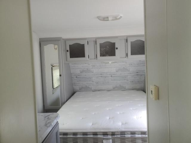 4YDT28521BT412040 - 2011 KEYSTONE PASSPORT WHITE photo 5