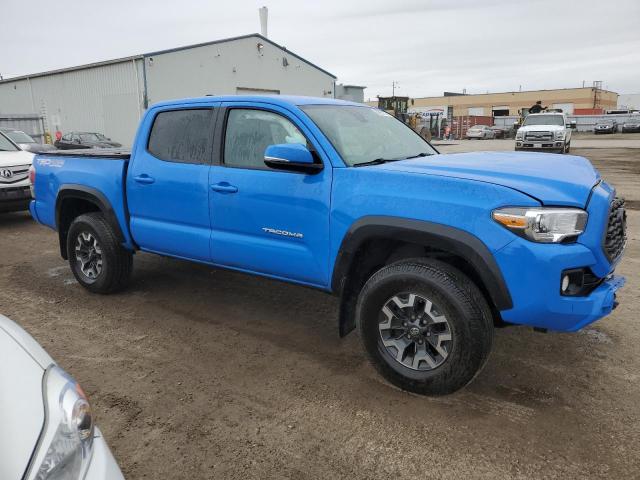 5TFCZ5AN8MX262694 - 2021 TOYOTA TACOMA DOUBLE CAB BLUE photo 4