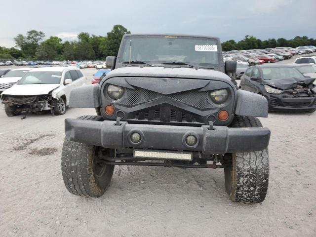 1C4HJWEG2CL128316 - 2012 JEEP WRANGLER UNLIMITED SAHARA შავი ფოტო 5