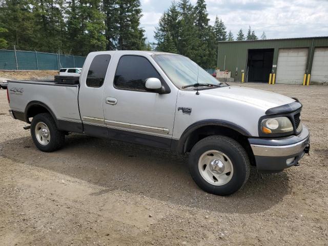 2FTRX18L4YCA79507 - 2000 FORD F150 SILVER photo 4