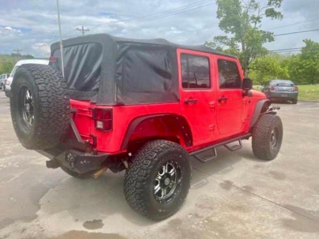 1C4BJWDG3DL669464 - 2013 JEEP WRANGLER U SPORT Rot Foto 4