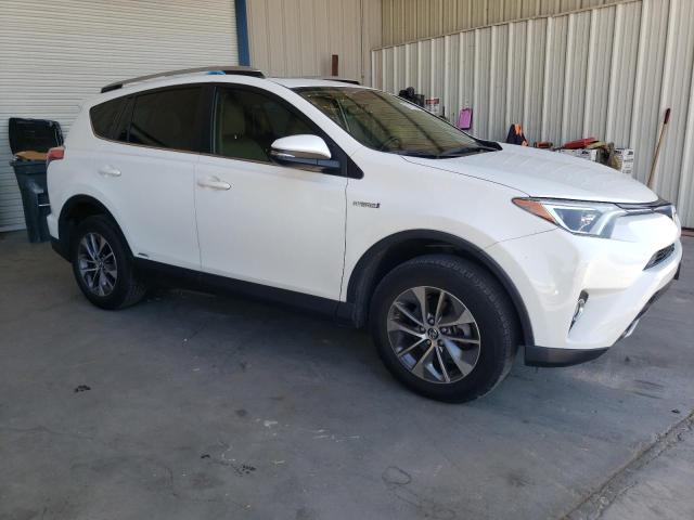 JTMRJREV2GD056103 - 2016 TOYOTA RAV4 HV XLE WHITE photo 4