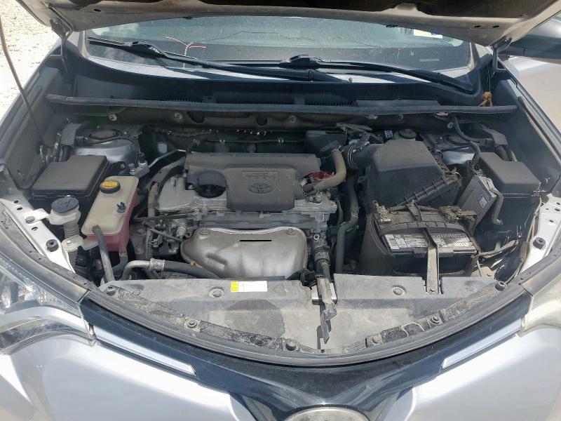 2T3ZFREV7JW421466 - 2018 TOYOTA RAV4 LE SILVER photo 12