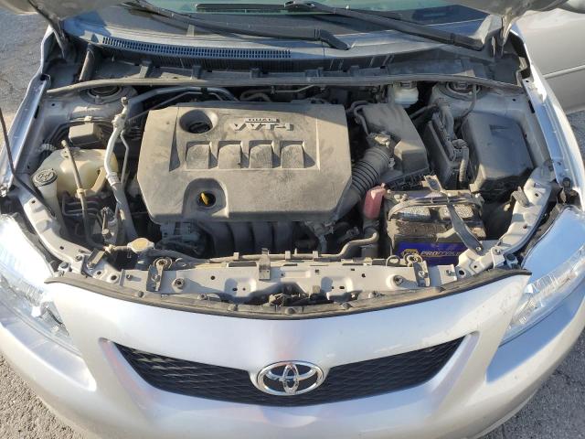 1NXBU4EE9AZ374573 - 2010 TOYOTA COROLLA BASE Silber Foto 11