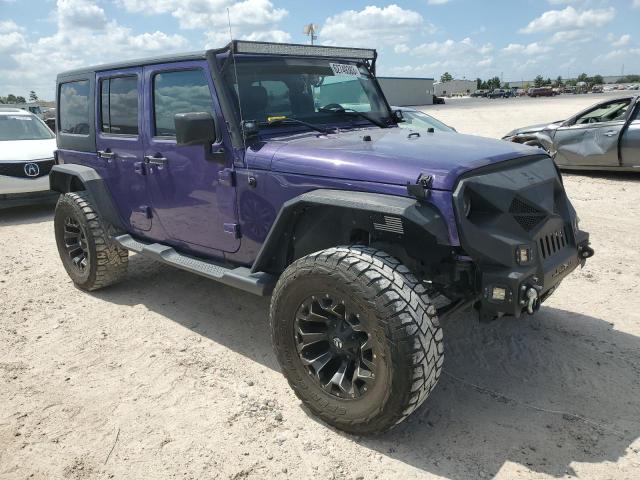 1C4BJWDG1HL617823 - 2017 JEEP WRANGLER U SPORT PURPLE photo 4