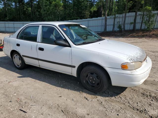 1Y1SK5284YZ436694 - 2000 CHEVROLET GEO PRIZM BASE WHITE photo 4
