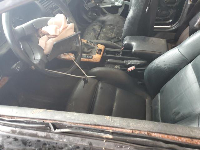 WBABJ5321RJC78011 - 1994 BMW 325 IC BLACK photo 7