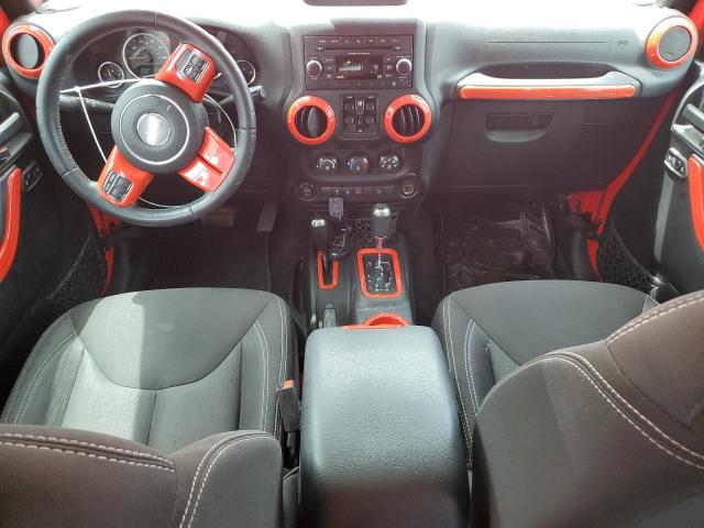 1C4BJWEG0FL586866 - 2015 JEEP WRANGLER U SAHARA RED photo 8