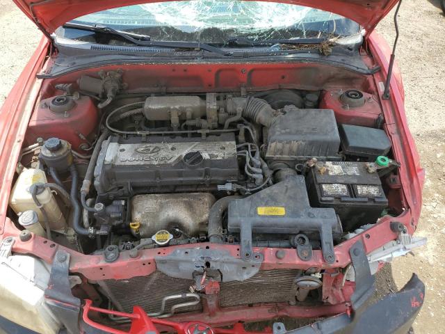 KMHCG35C92U220404 - 2002 HYUNDAI ACCENT GS RED photo 11