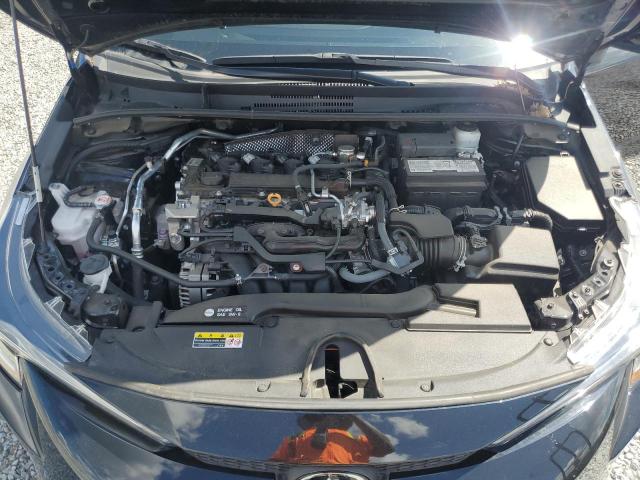 5YFB4MDE5PP059670 - 2023 TOYOTA COROLLA LE Schwarz Foto 11