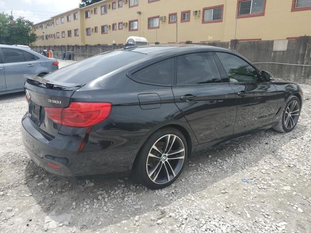 WBA8Z9C3XHG826440 - 2017 BMW 330 XIGT BLACK photo 3