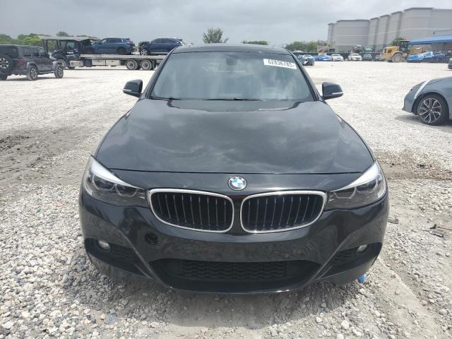 WBA8Z9C3XHG826440 - 2017 BMW 330 XIGT BLACK photo 5