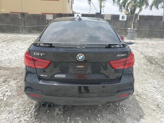 WBA8Z9C3XHG826440 - 2017 BMW 330 XIGT BLACK photo 6
