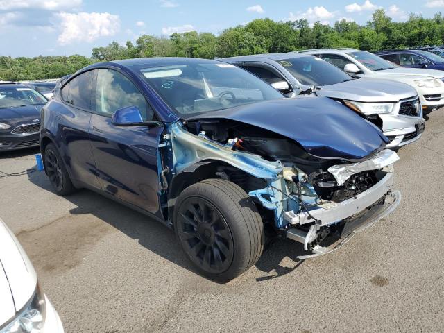 7SAYGAEE0PF637428 - 2023 TESLA MODEL Y Blau Foto 4