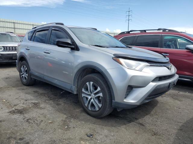 2T3ZFREV3HW395068 - 2017 TOYOTA RAV4 LE SILVER photo 4