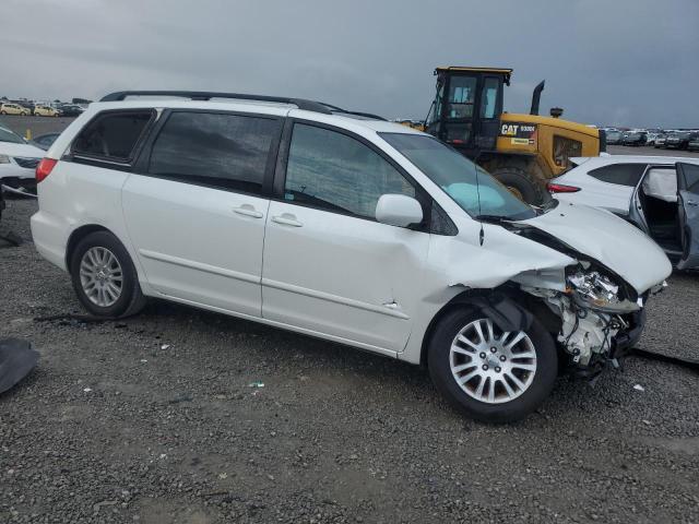 5TDZK22C39S262447 - 2009 TOYOTA SIENNA XLE WHITE photo 4